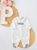 Babygrow elegante de veludo